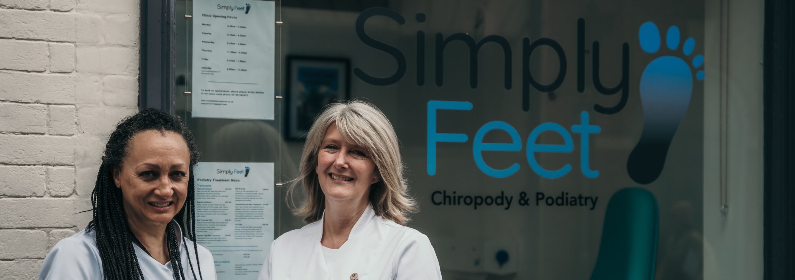 Angela Churchill and Jennifer Benn outside Simply Feet chiropody and podiatry clinic