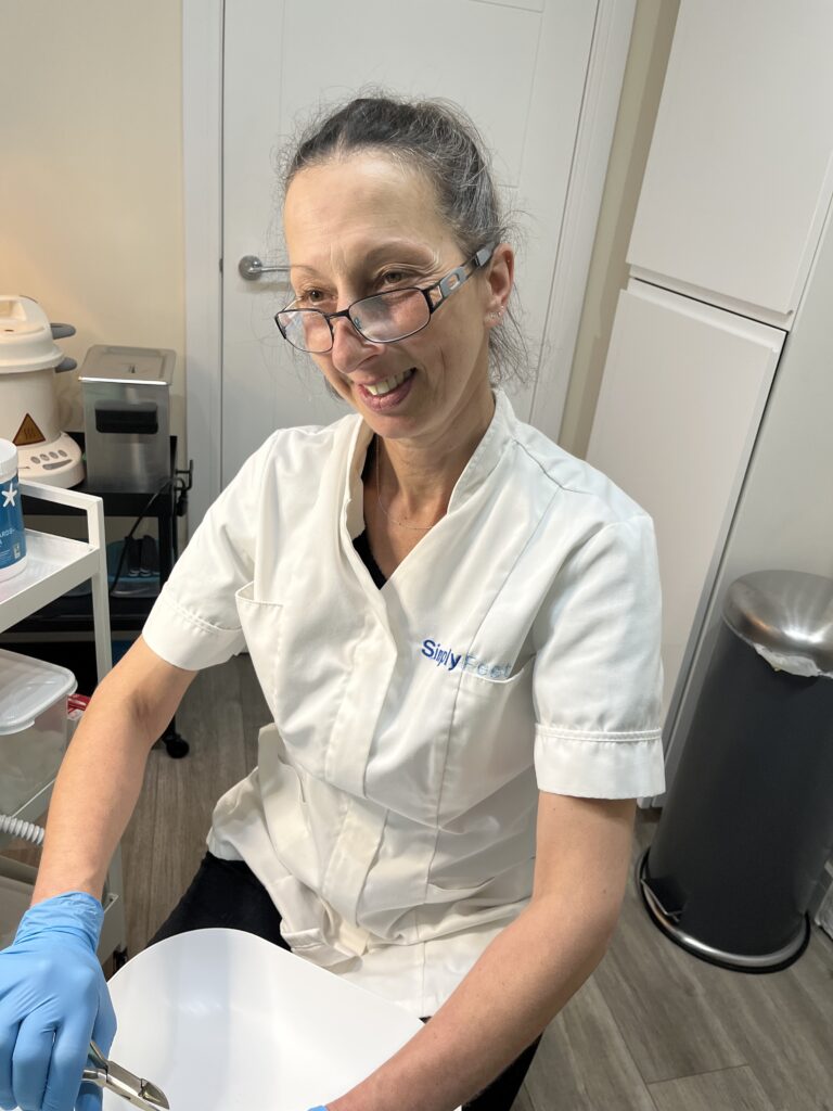 Manuela Bellows working on a patient